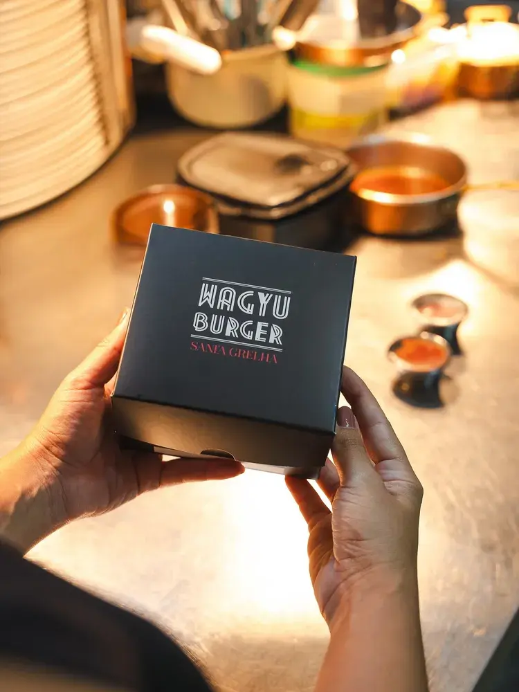 Caixa do cheeseburger de wagyu do Santa Grelha, ideal para o evento Duo Burger.