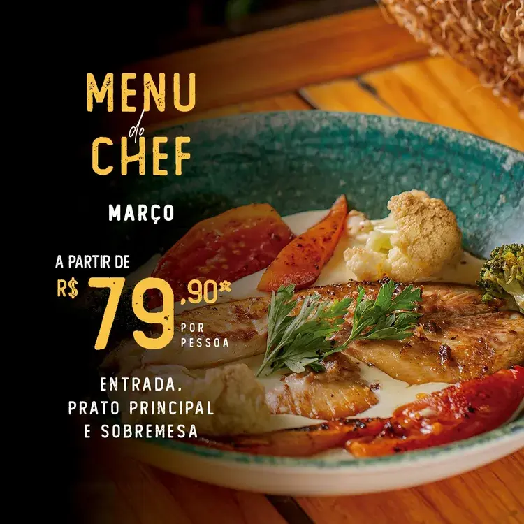 Imagem de um prato do Menu de Chef do NAU João Pessoa, mostrando uma apresentação de filé de tilápia com legumes assados. Detalhes sobre o menu e preços estão presentes na descrição do post.